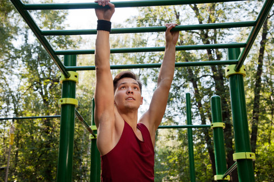 Young man doing fitness exercise