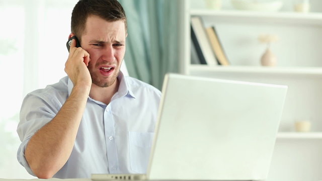 Stressed man having on-call duty
