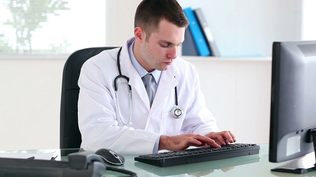 Doctor using a computer