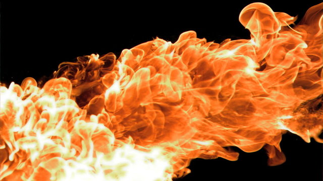 Spray of fire in super slow motion appearing