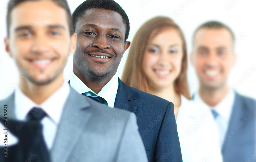 Wall mural Happy smiling business team standing in a row