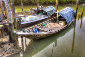 Fototapeta na wymiar traditional wooden boat in hdr