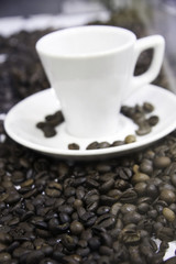 Coffee beans and a cup of coffee