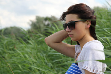 portrait of attractive woman in reed