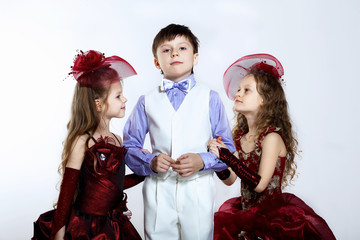 Little girl in beautiful dress and boy