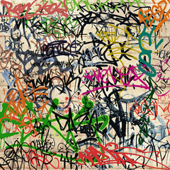 Un mur avec beaucoup de graffitis
