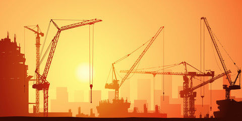 Lots of Tower Cranes on Construction Site