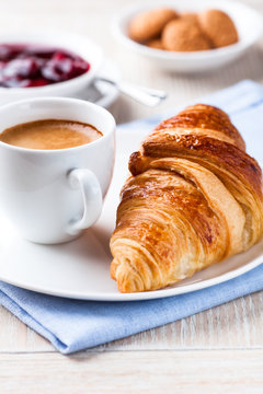 Fototapeta Croissant and a cup of espresso