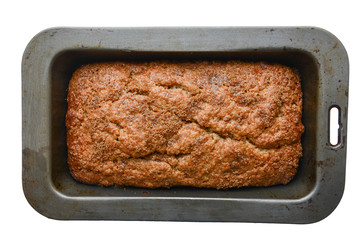 Banana Bread ready in a baking dish - isolated on white