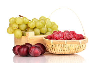 ripe fruits and berries isolated on white
