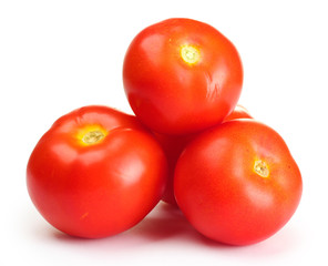 Ripe red tomatoes isolated on white