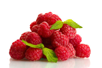 ripe raspberries with mint  isolated on white