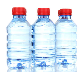 plastic bottles of water isolated on white