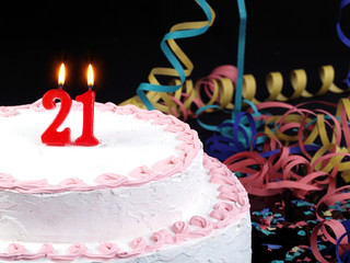 Birthday cake with red candles showing Nr. 21