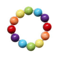 Color beads close up on a white background.