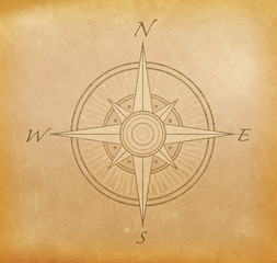 Grunge paper background with image of compass rose.