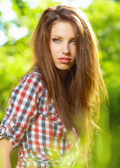 Portrait of a beautiful woman in the garden