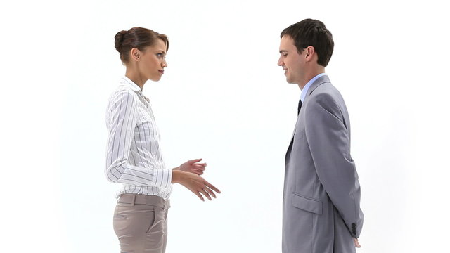 Business woman speaking to a man