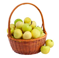 Organic apples in a basket isolated on white