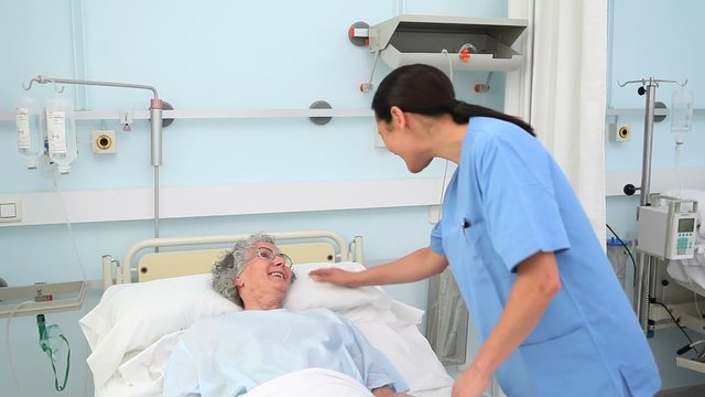 Intern holding a patient hands