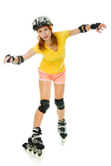 beautiful young woman on roller skates - obrazy, fototapety, plakaty