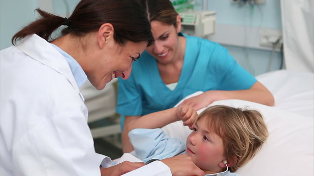 Doctor examining  a child