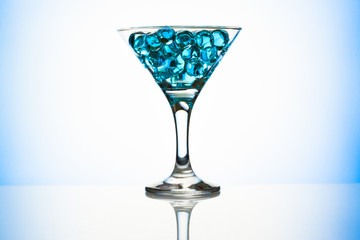 Martini glass with blue water gel beads