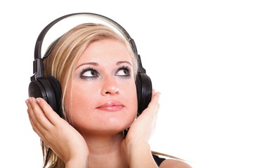 Fototapeta premium Woman with headphones listening to music isolated white backgrou