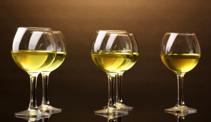 Wineglass on brown background