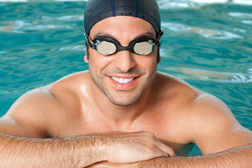 Happy athlete at pool