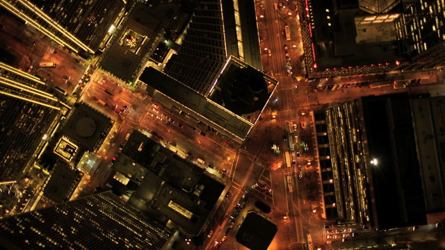 Aerial vertical view at night of city traffic illuminated, USA