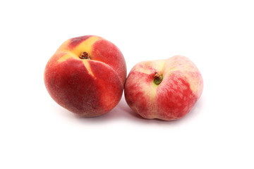 Fototapeta na wymiar one wild and one cultivated peach