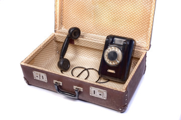 Old phone in old suitcase