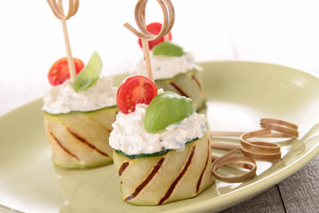 appetizer, grilled zucchini with cheese ,tomato and basil