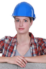 Portrait of woman with construction helmet