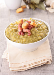 bowl of split pea soup and bacon