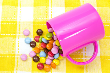 colorful chocolate and mug
