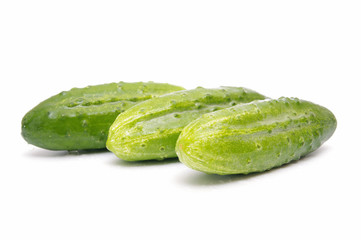 Fresh cucumbers isolated on white