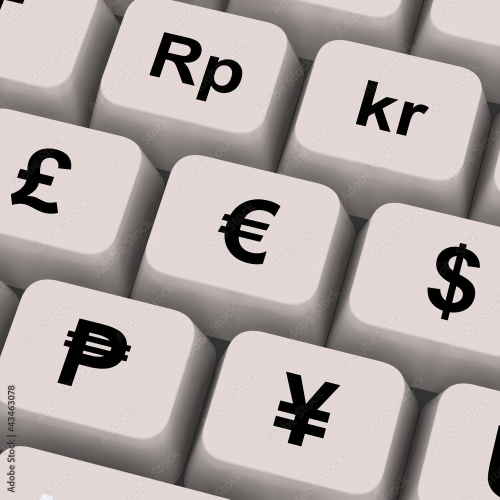 Poster currency symbols on computer keys showing exchange rates