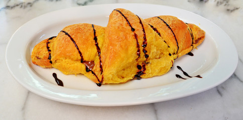 croissant and hot chocolate