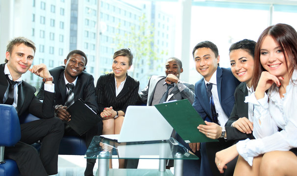 Satisfied Proud Business Team Looking At Camera