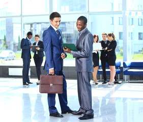 Two businessmen discussing - Isolated studio