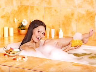 Woman take water bath.