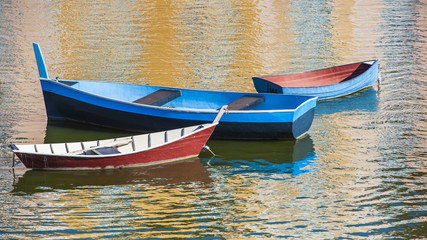 Three Boats in Harbor