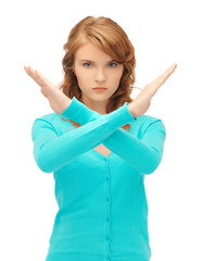 young woman making stop gesture