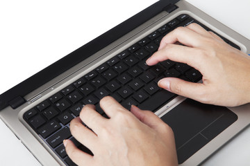 Closeup of hands typing