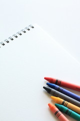 sketch book and crayon