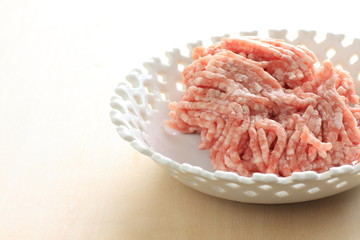 Freshing mince Pork meat in white bowl with copy space