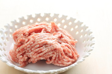 Freshing mince Pork meat in white bowl with copy space