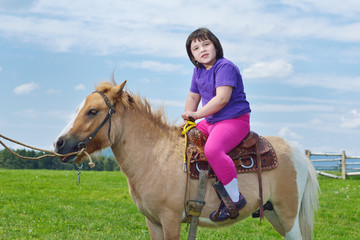 Obraz premium child ride pony